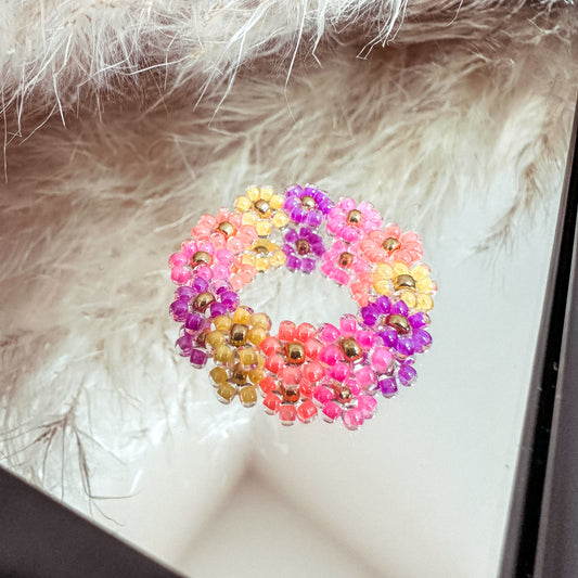 Blumenring "Milly" aus Glasperlen in Lila, Pink, Orange und Gelb