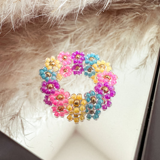 Blumenring "Milly" aus Glasperlen in Pink, Lila, Blau und Gelb