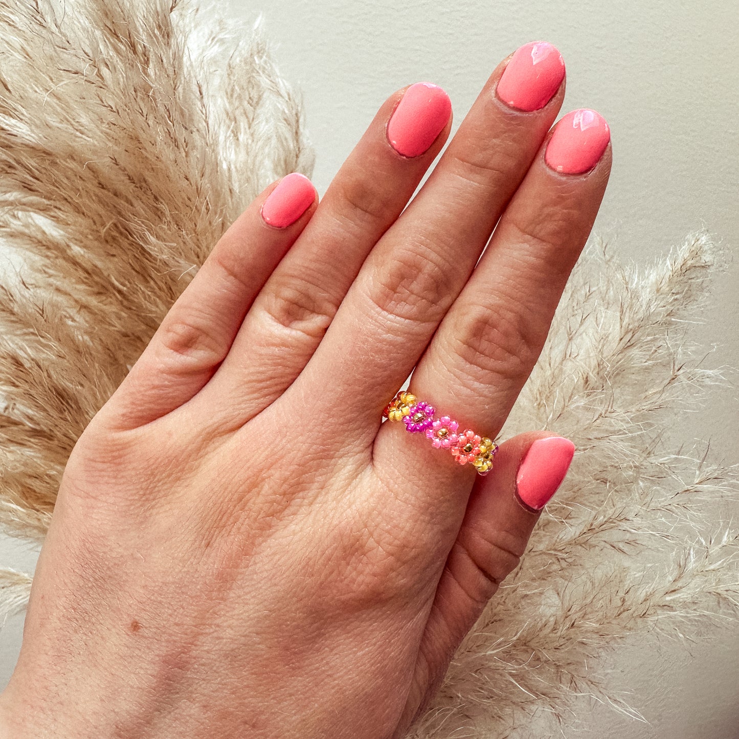 Blumenring "Milly" aus Glasperlen in Lila, Pink, Orange und Gelb