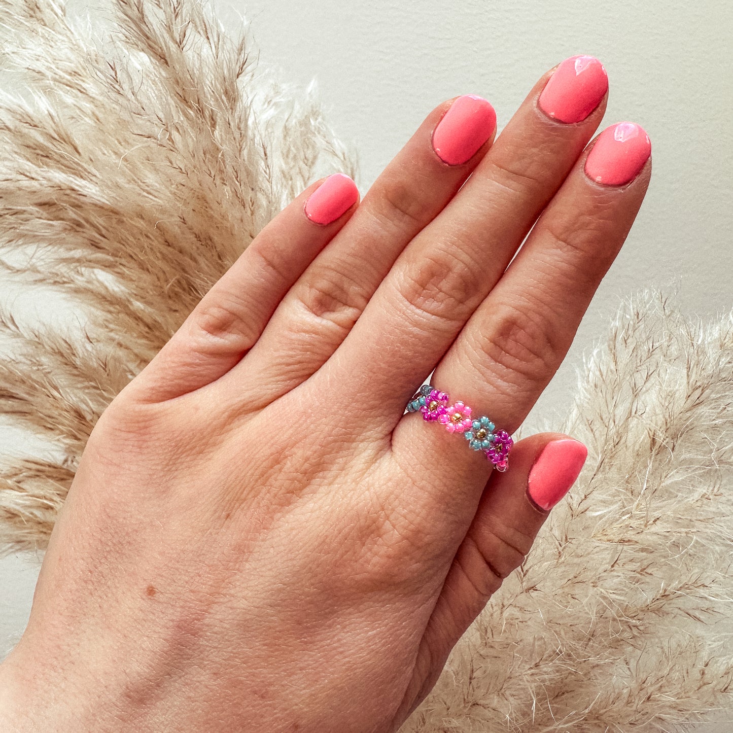 Blumenring "Poppy" aus Glasperlen in Pink, Lila und Blau