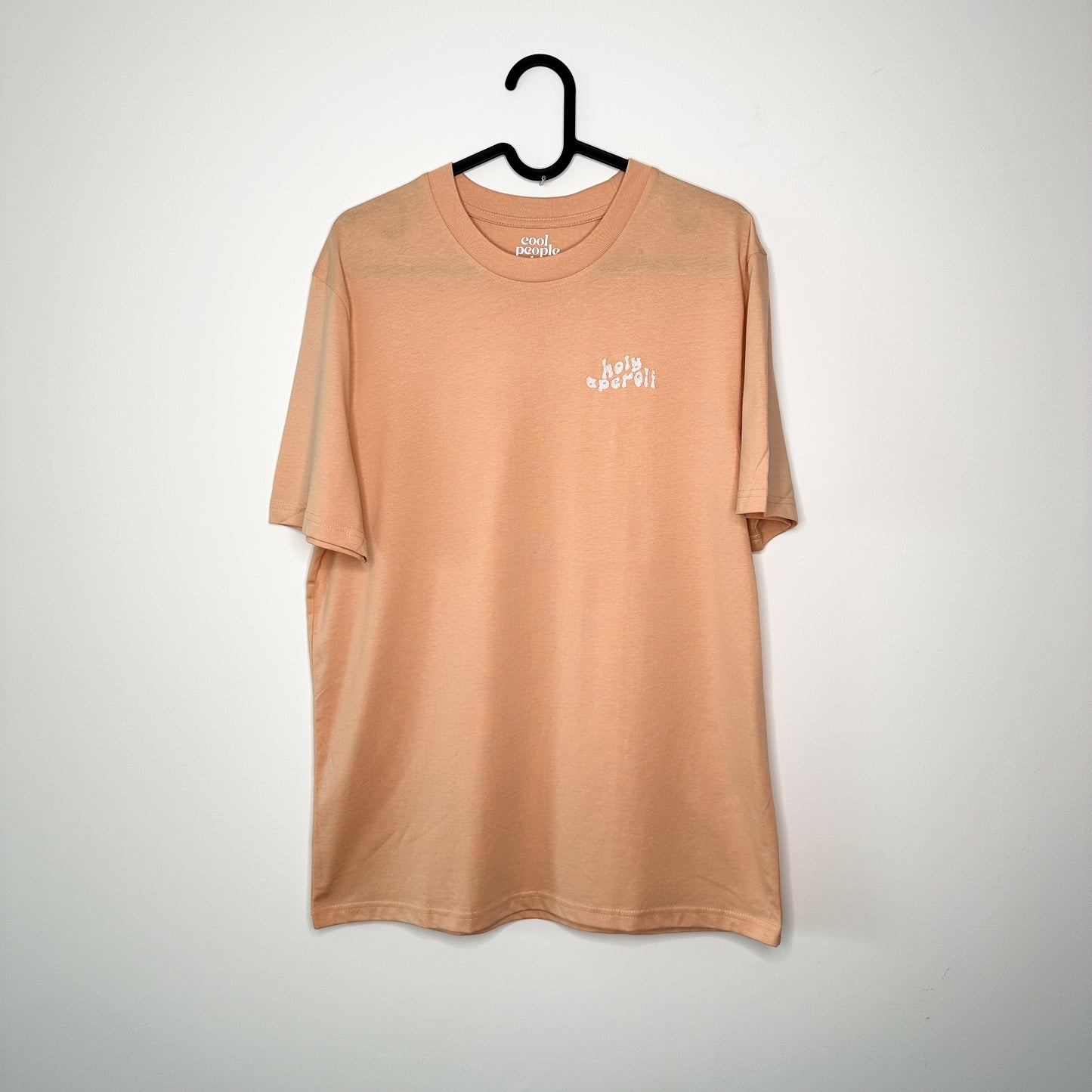 Unisex T-Shirt in Apricot mit Stick „Holy Aperoli“