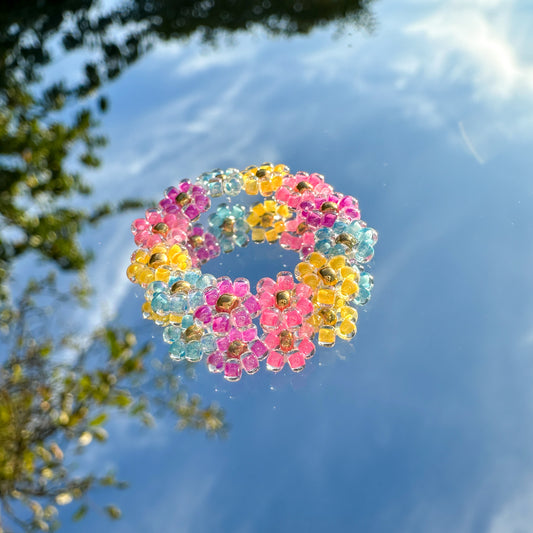 Blumenring "Milly" aus Glasperlen in Pink, Lila, Blau und Gelb