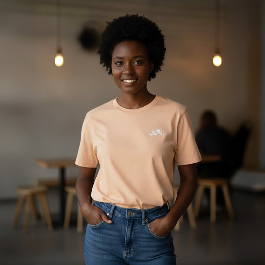Unisex T-Shirt in Apricot mit Stick „Holy Aperoli“